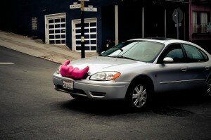 lyft car driving in the street