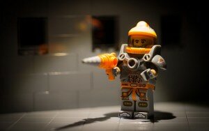 lego man with a drill